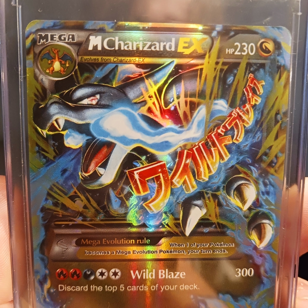 M Charizard EX 69/106